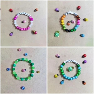 Personalized Ladybug Name Bracelet with turtle and evil eye charms for girls