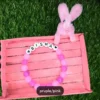 Personalized Easter Name Bracelet with colorful beads and bunny charm handmade by The Beading Sisters