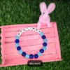 Personalized Easter Name Bracelet with colorful beads and bunny charm handmade by The Beading Sisters