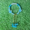 Blue personalized name bracelet with flower charm and hanging bead chain