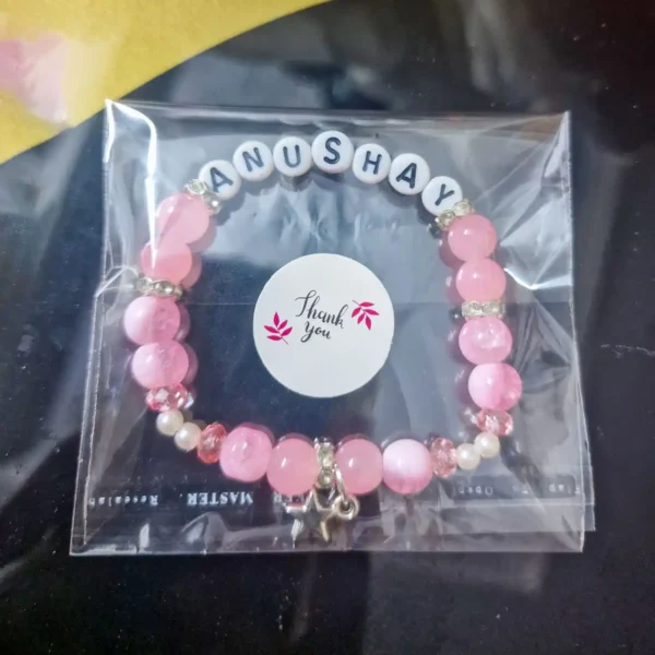Personalized Luxe Pink Bracelet with custom names in thank you packaging