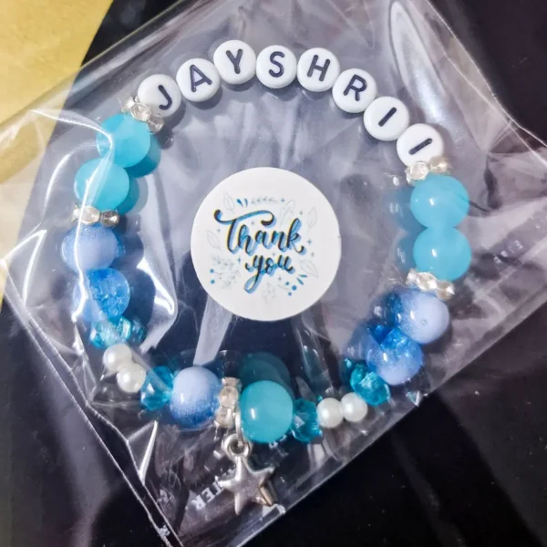 Personalized Luxe Blue Bracelet with custom names in thank you packaging