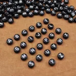 Black alphabet beads with white A to Z letters for making personalized name bracelets