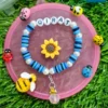 Handmade personalized name bracelet with daisy flower charm for kids