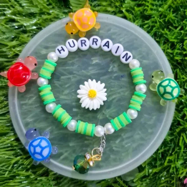 Personalized kids name bracelet with sunflower butterfly and ladybug charms - The Beading Sisters